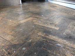 Dirty walnut herringbone floor