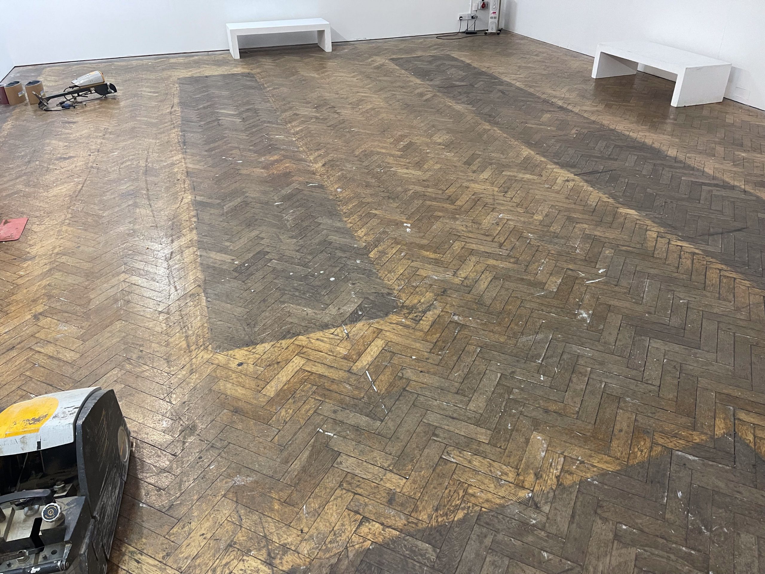 dirty herringbone timber floor