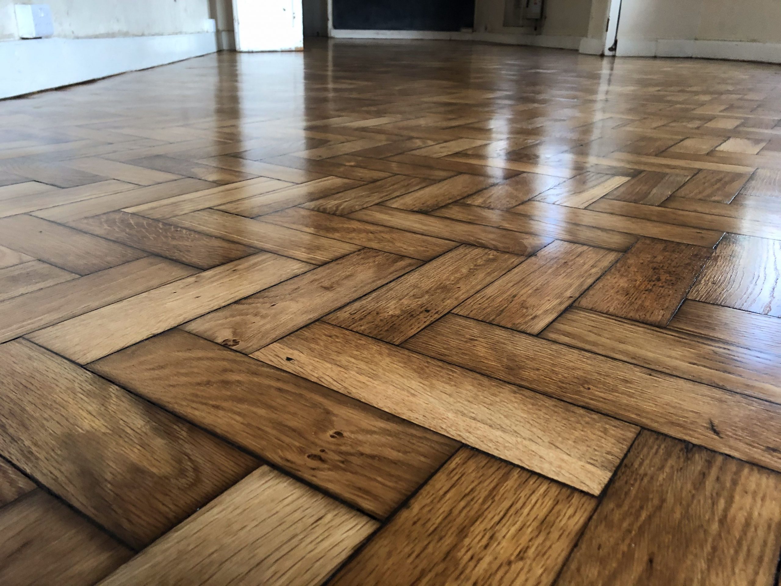 Badly worn timber floor